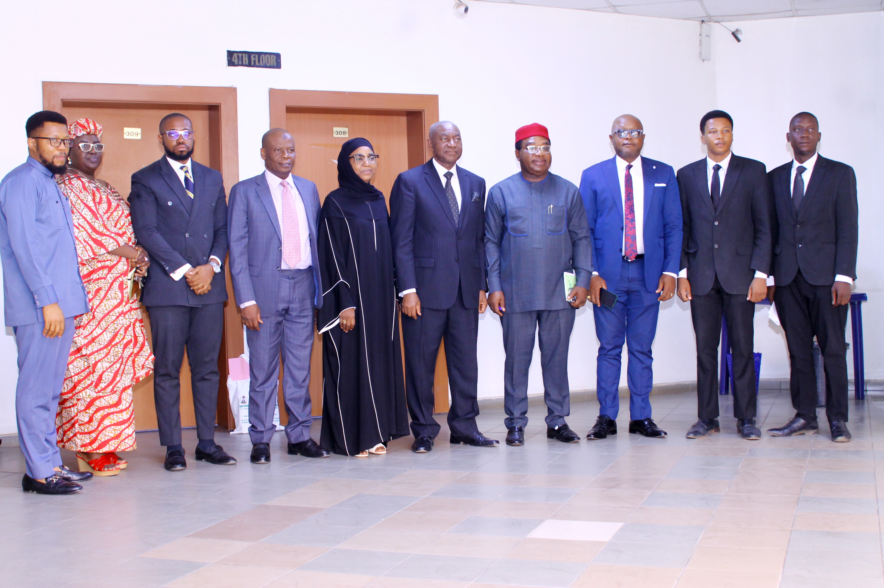 Chief Solomon Akuma, SAN with the ES, Directors and senior staff of the Comm.